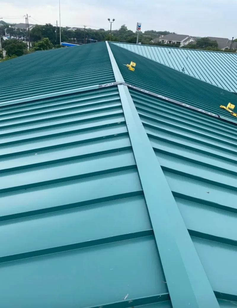 Green commercial metal roof ridge and valley for Metal Roof Repair in Horizon West